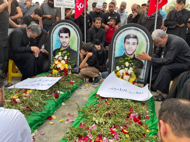 People gather around the symbolic graves of Jaafar Sultan (left) and Sadeq Thamer, in Bahrain. Twitter @YusufAlJamri